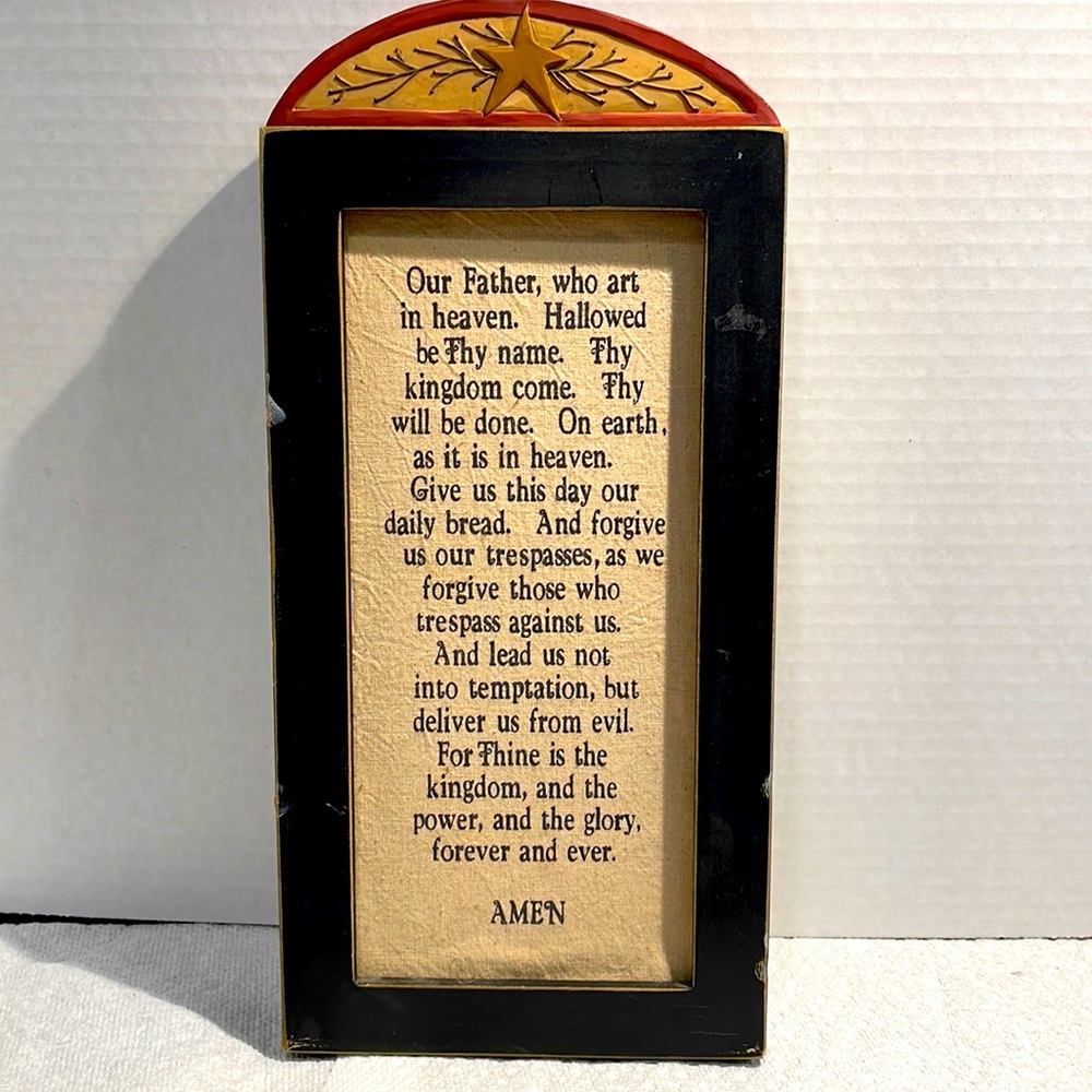 Wooden sign with The Lords Prayer printed on fabric